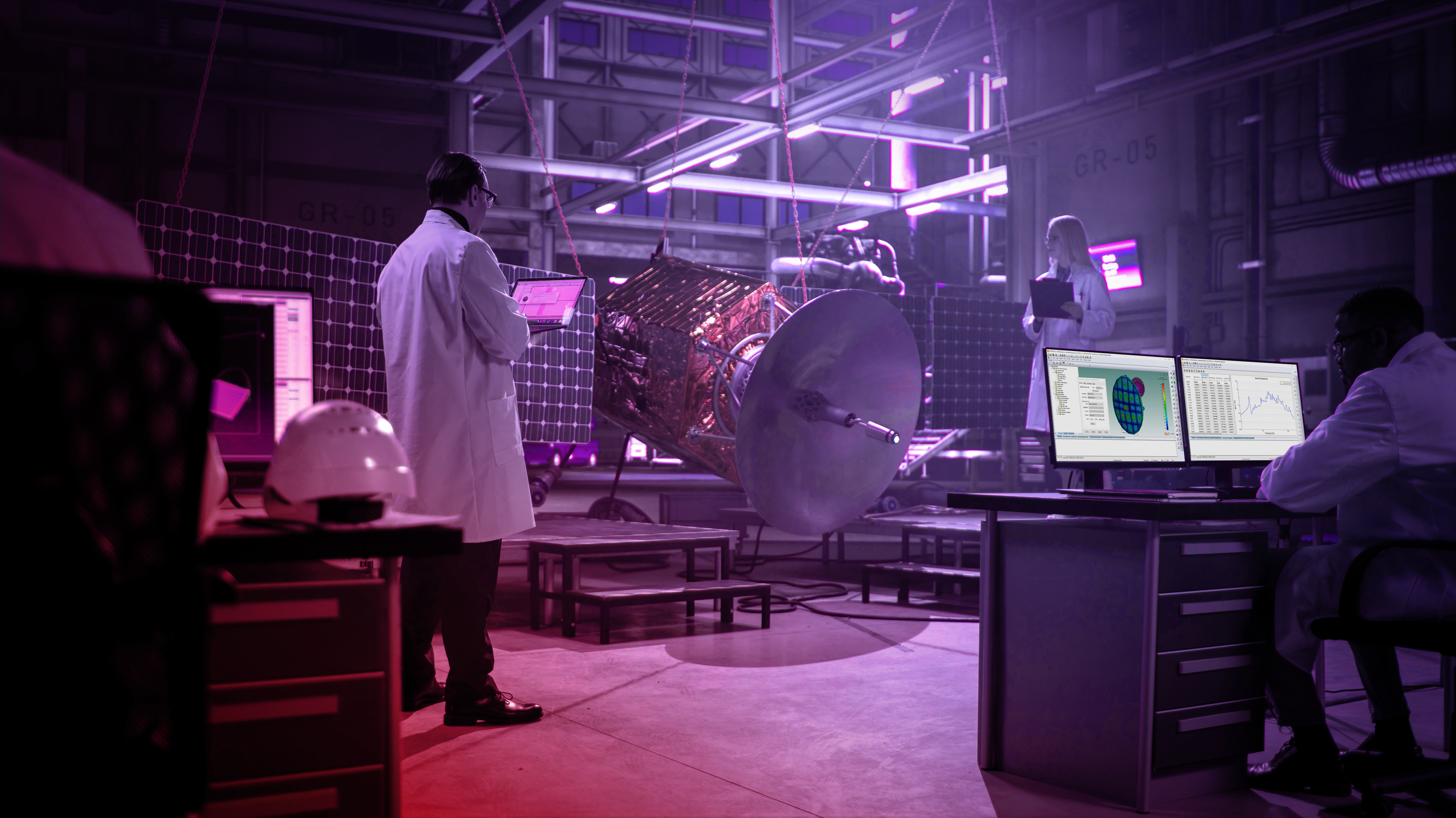 Two engineers analyzing a 3D render in a laboratory