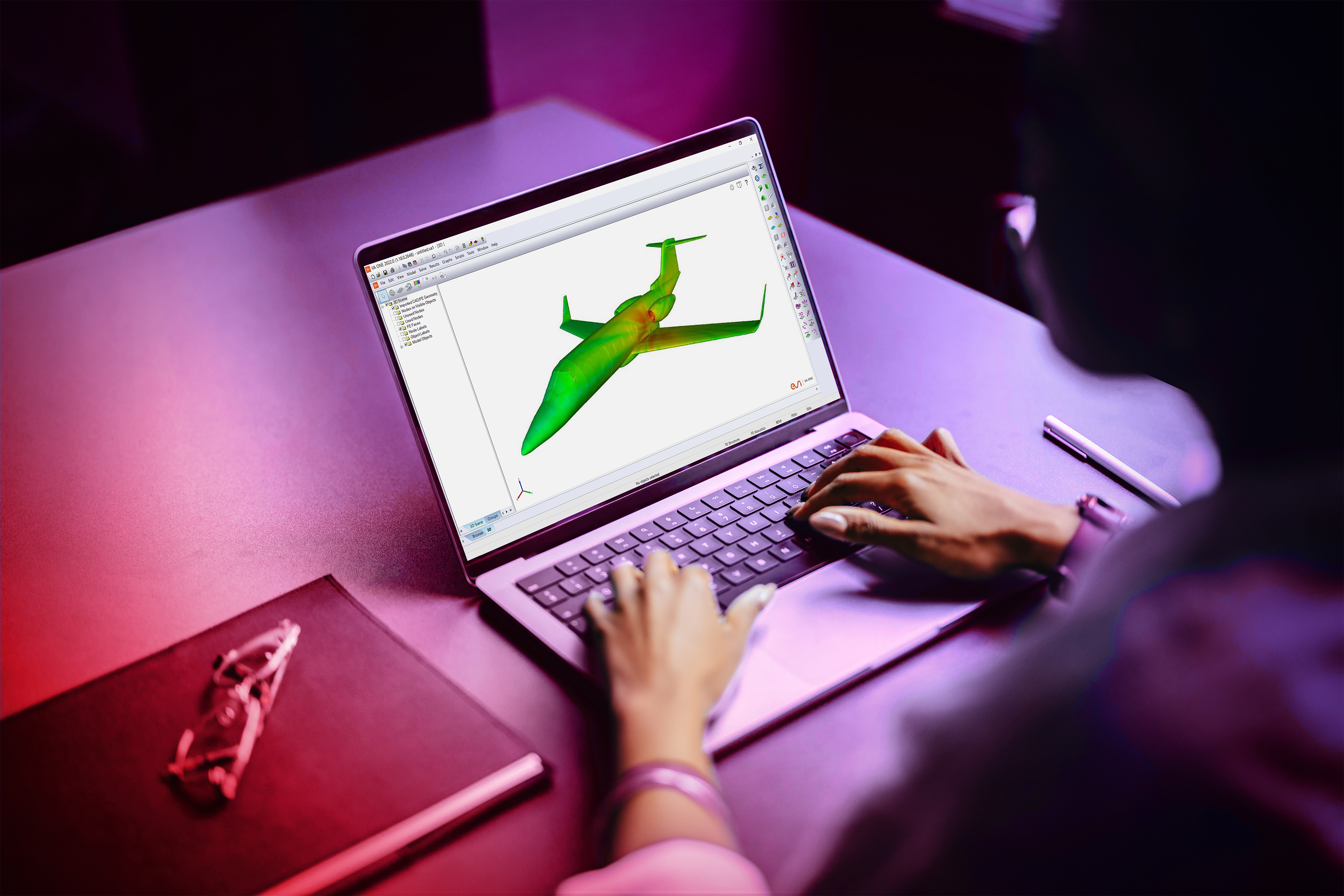 Engineer analyzing a 3D model on a computer screen