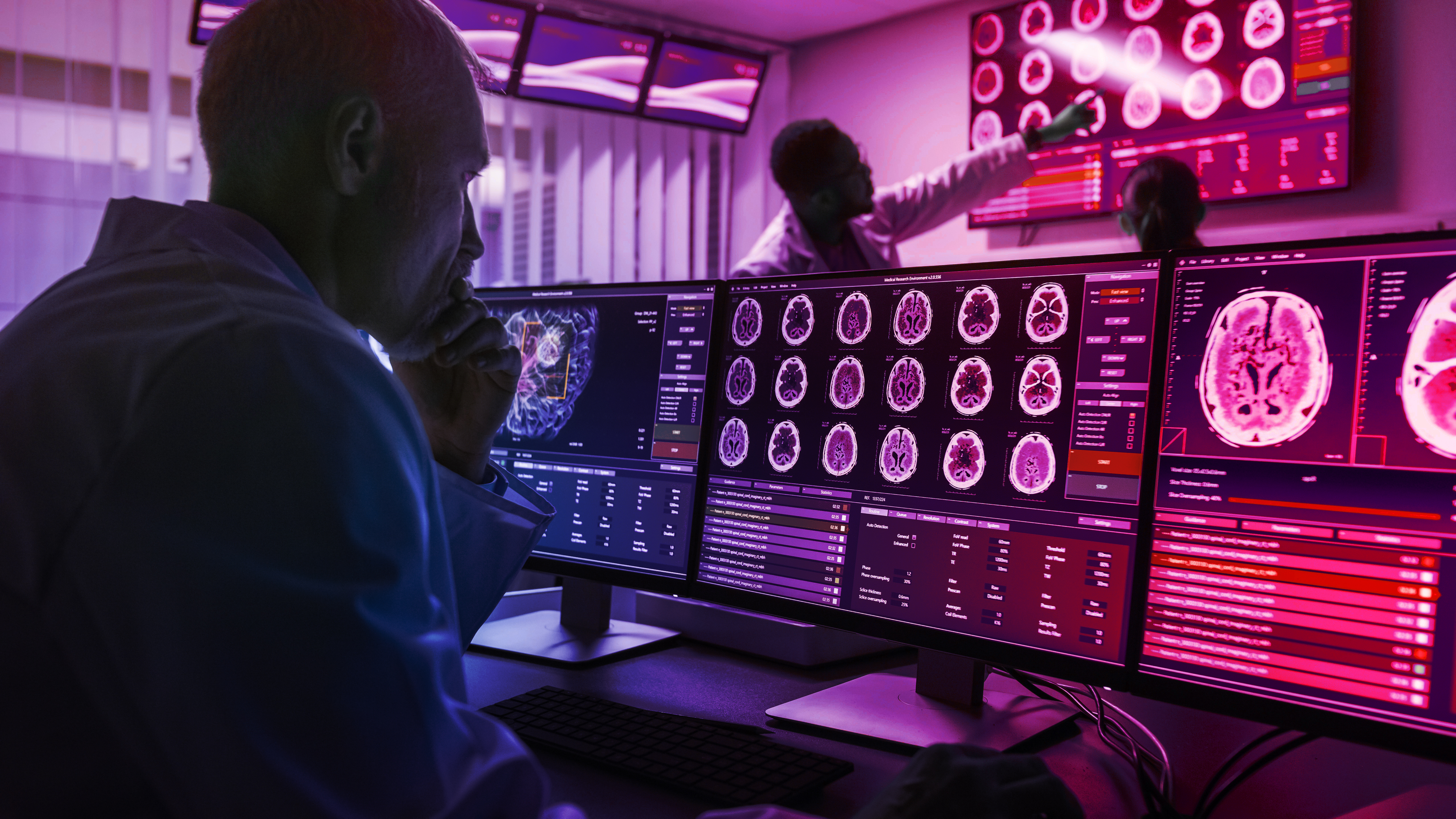 Person reviewing medical imaging data on a computer screen