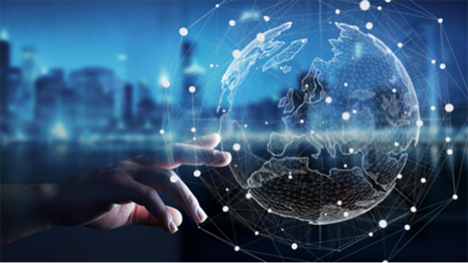 A hand reaches toward a glowing holographic globe surrounded by a network of connected nodes, with a blurred blue city skyline in the background.