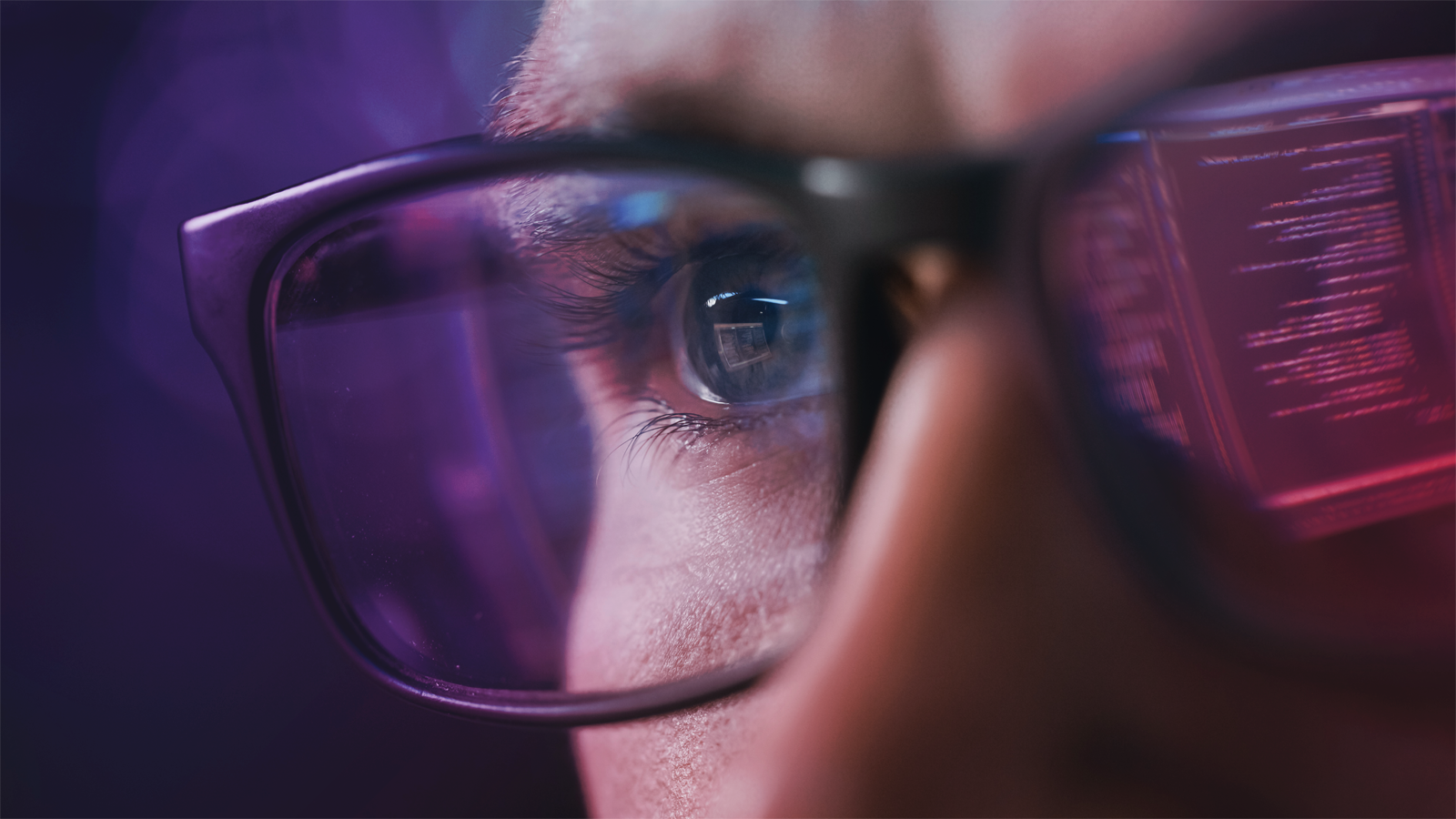 Close-up of engineer performing analysis