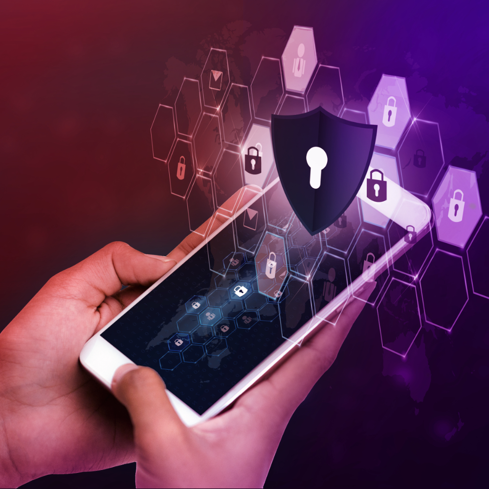 mobile phone held in hands with security shield
